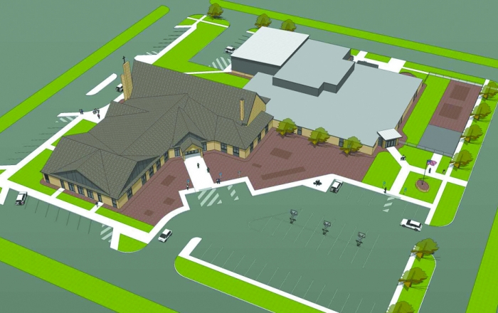 This drawing shows the Parish Center addition with the various roof pitches extending south from St. Mary’s Church. It also shows the entrance to the Parish Center and the new entrance to St. Mary School. An addition to the school can be seen towards the top (white roof area).